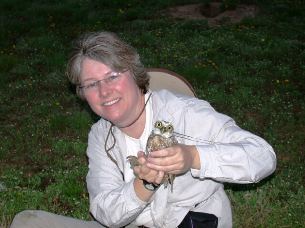 Dr. Nancy McIntyre and a burrowing owl
