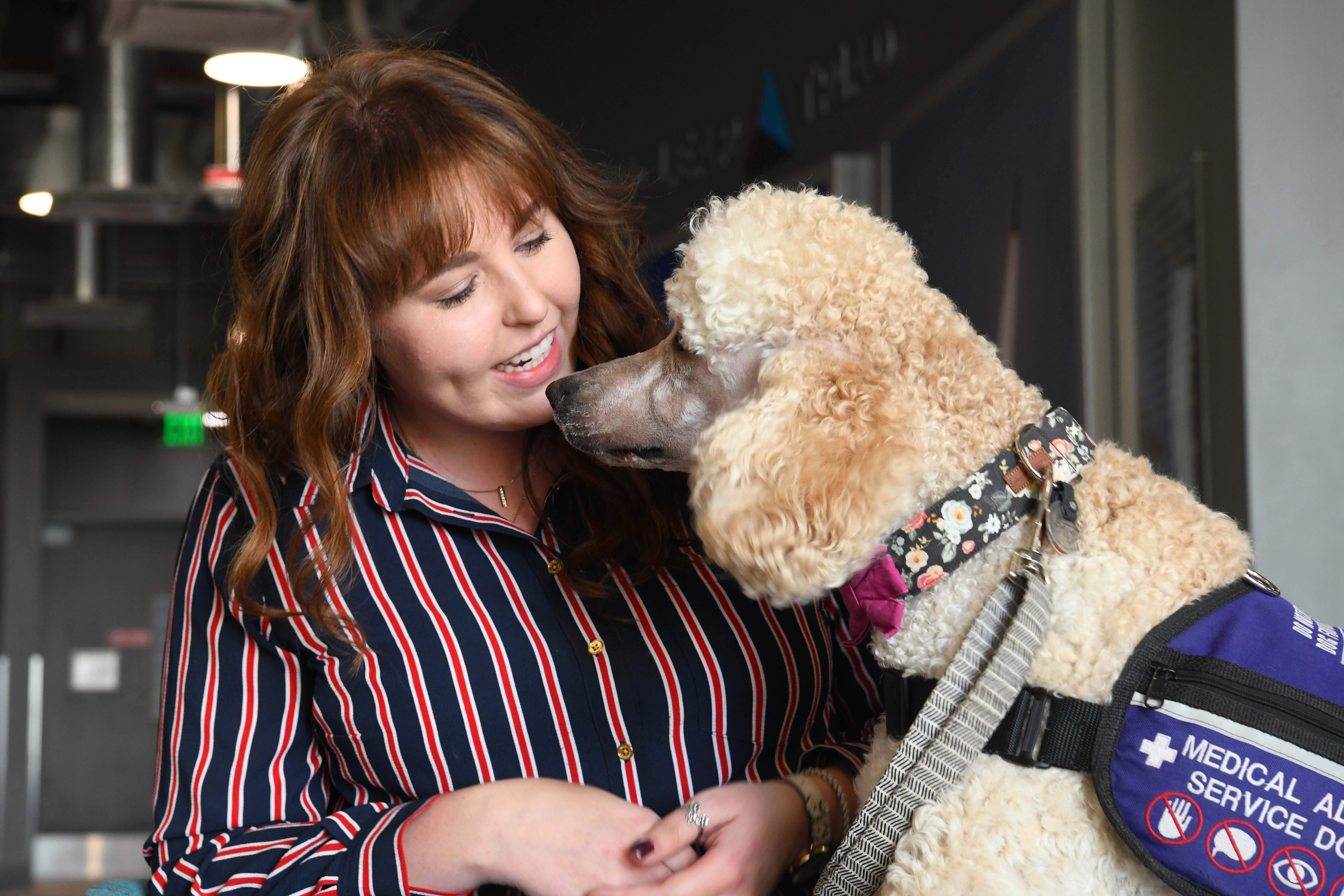 Pantexan Claire Streeter is open to educating people about Type 1 diabetes and service dogs like her standard poodle, Betty.