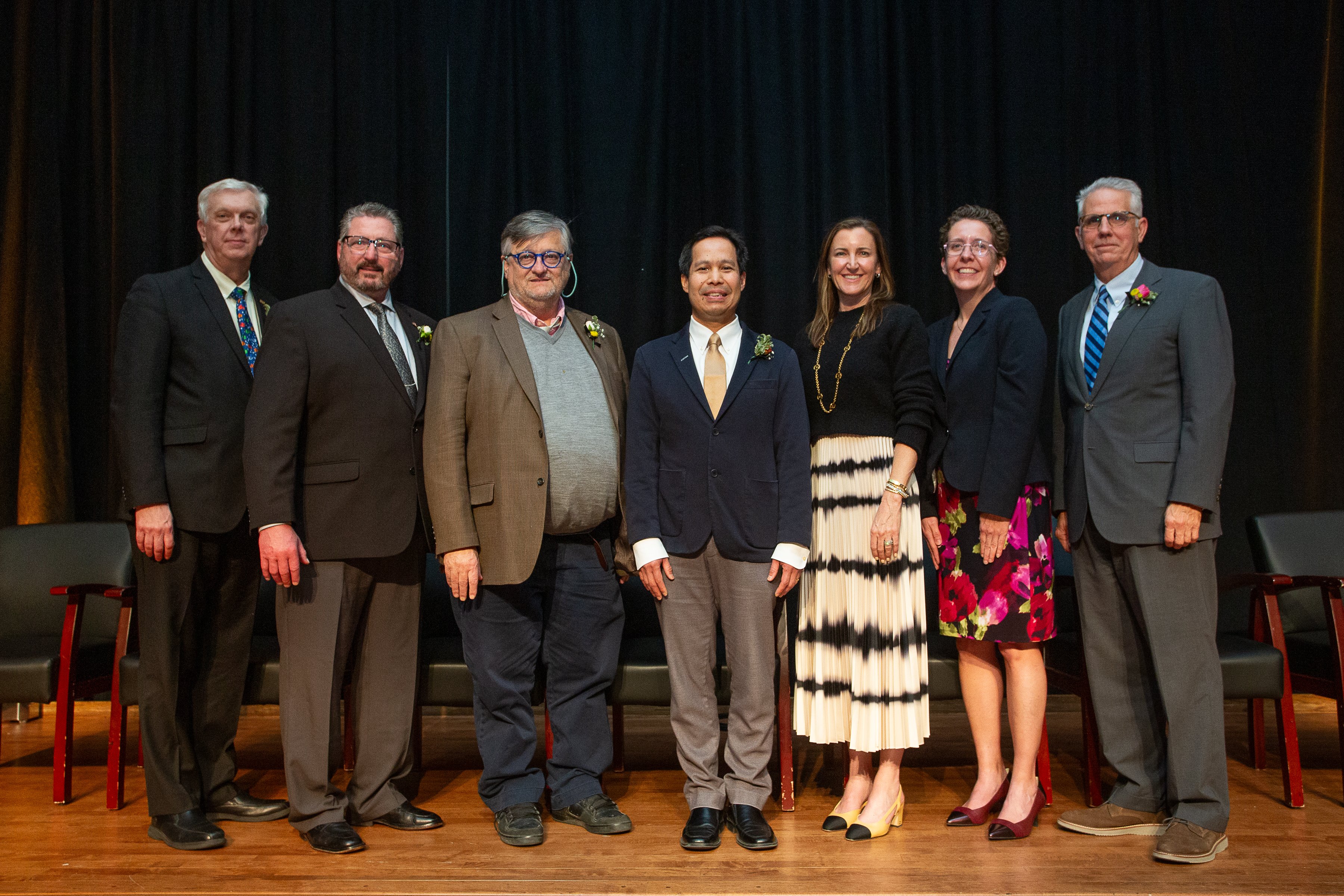 Hansen (second from the left) standing with other Purdue Alumni Achievement Award Honorees. 
