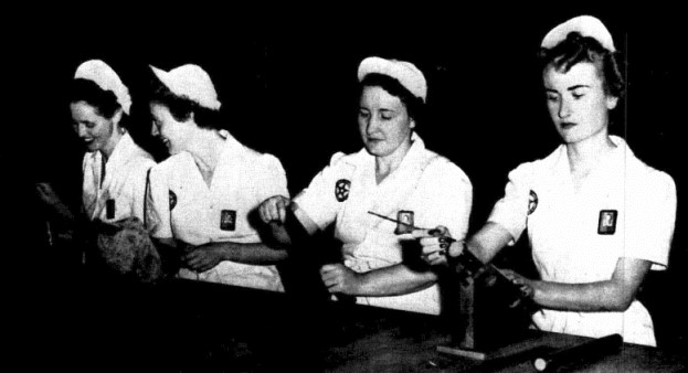 Moselle McDaniels (left), Margaret Deal, Josephine Eubanks and Betty Solomon build boosters