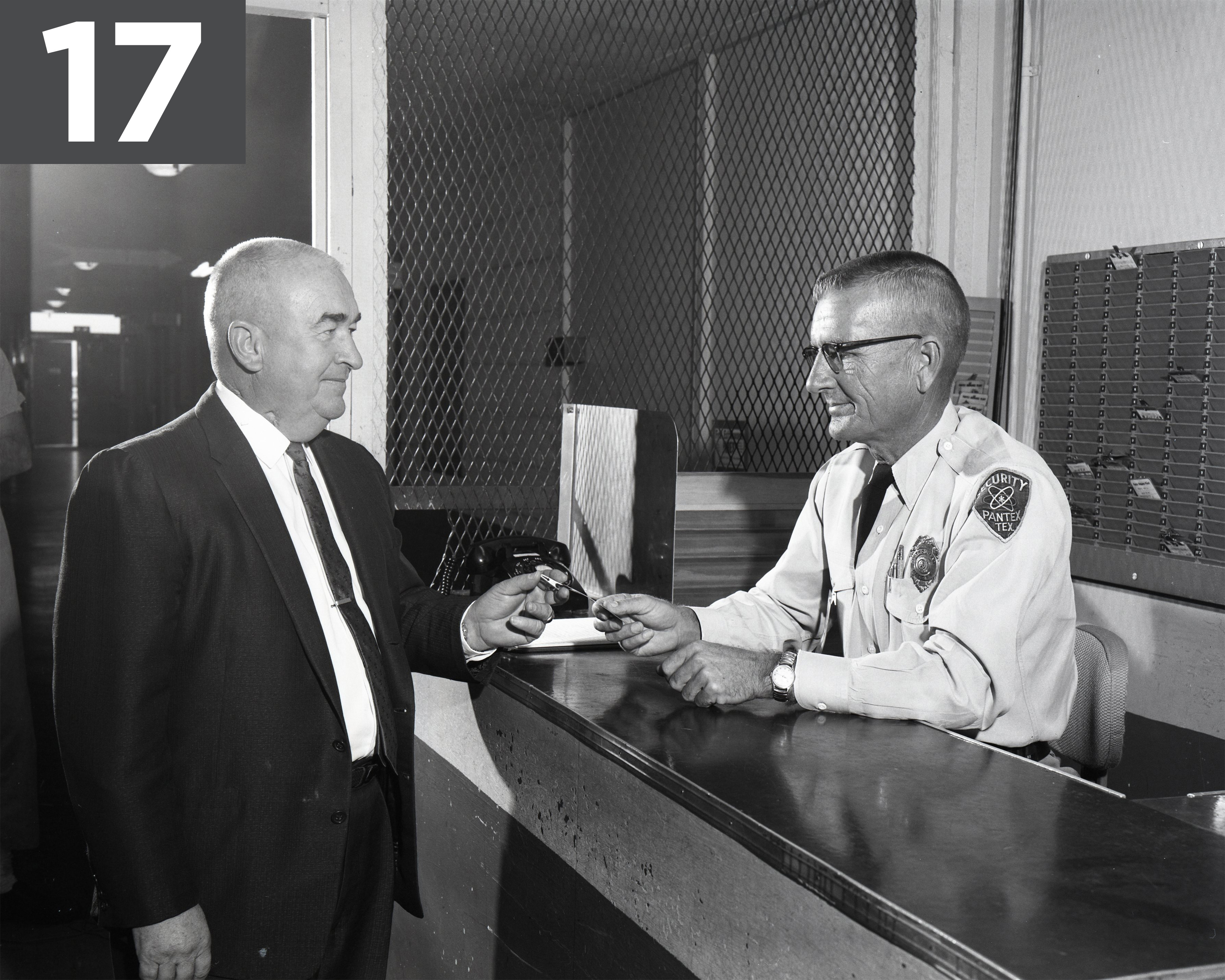 1962 - John C. Drummonds having his badge checked 1962 - John C. Drummonds having his badge checked