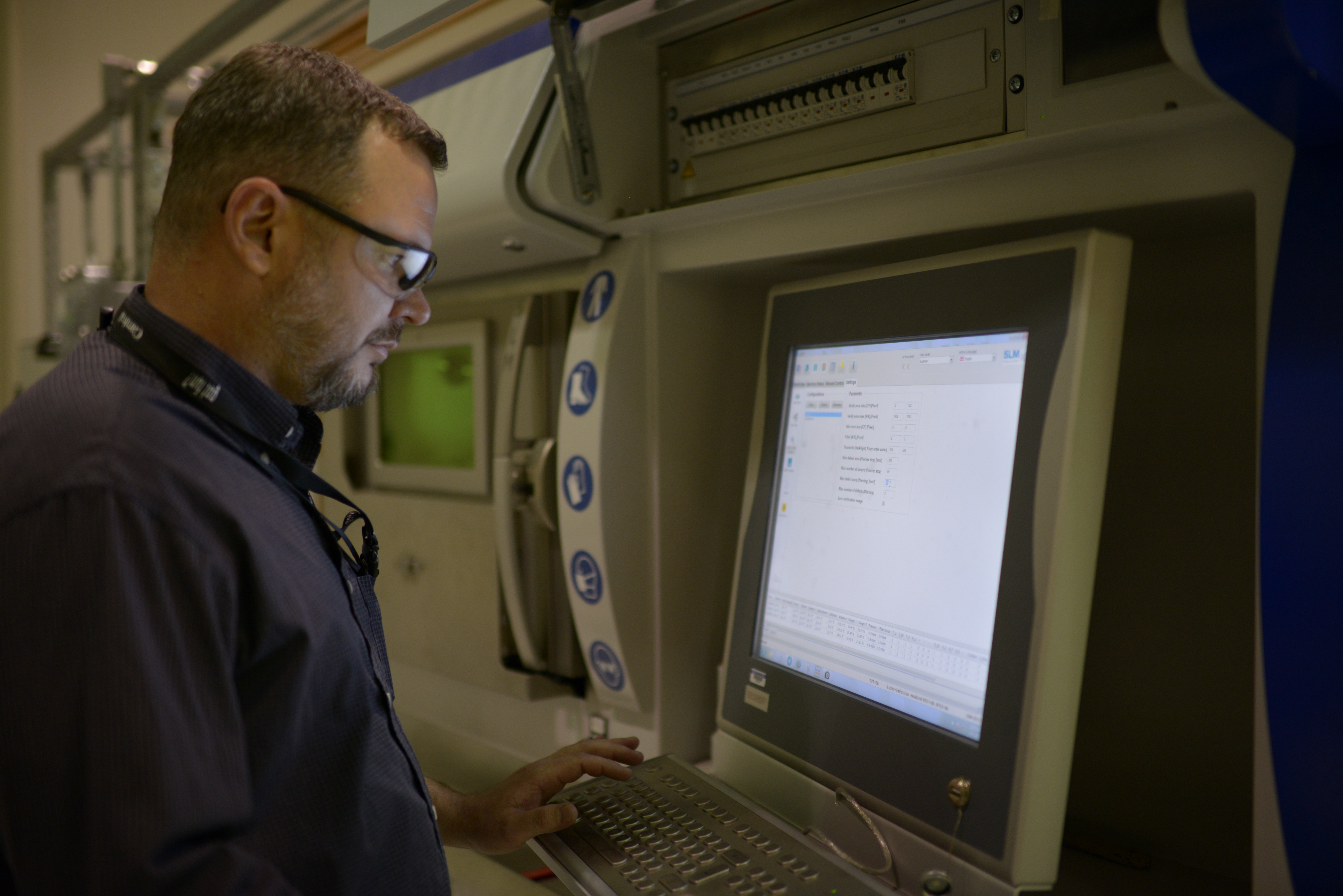 Pantex’s Tek F. is seen working on the SLM 280 Metal 3D printer