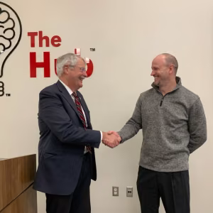 Dr. Joseph Heppert, Texas Tech University’s vice president for research and innovation shaking hands with Pantex Site Manager Colby Yeary